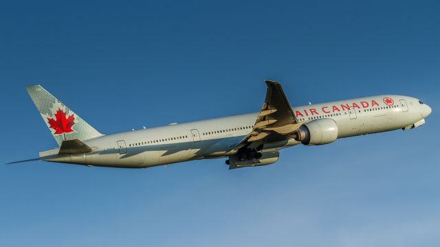 BOEING 777-300ER (C-FRAM) - Setting sun casts some long shadows as ACA856 sets off for Heathrow