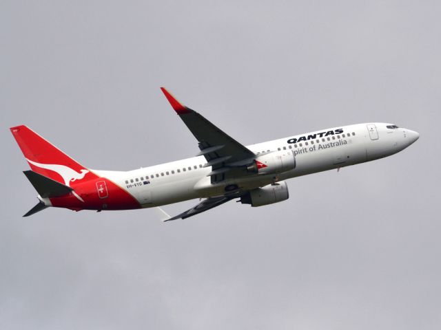 Boeing 737-800 (VH-VYG) - Getting airborne off runway 23 on a cold, gloomy winters day. Wednesday 4th July 2012.