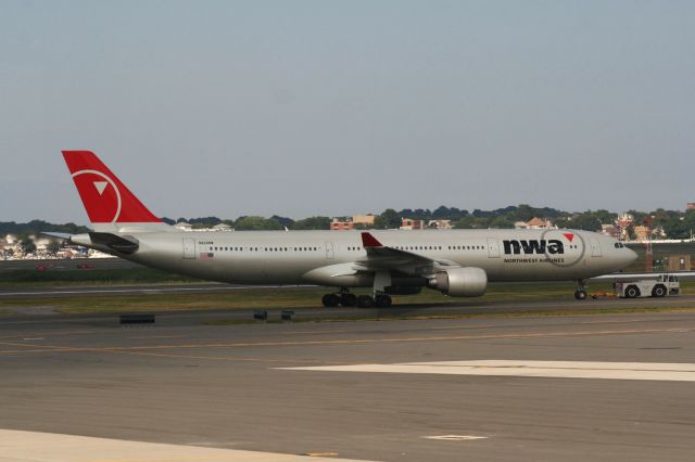 Airbus A330-300 (N820NW) - This Northwest A330-300 prepares to depart BOS for AMS on 8/15/09. Plane continues to fly for Delta today. 