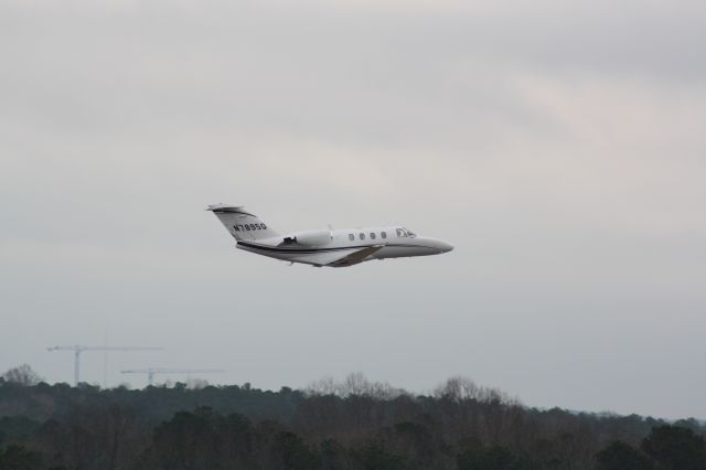 Cessna Citation CJ1 (N7895Q) - N7895Q taking off runway 23L