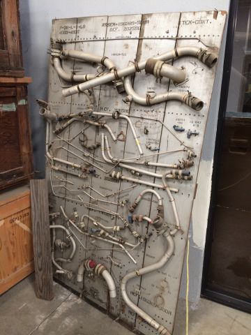 Lockheed P-38 Lightning — - Inside the restoration hangar at Yanks Air Museum. Appears to be hose / tube clamp configuration for the P38-L.  Presume this was from the Lockheed plant or Vultee.