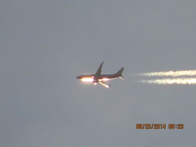 Boeing 737-800 (N8313F) - Southwesst flight 2316 from Midway to Houston over Baxter Sprigns Ks at 38,000 feet.