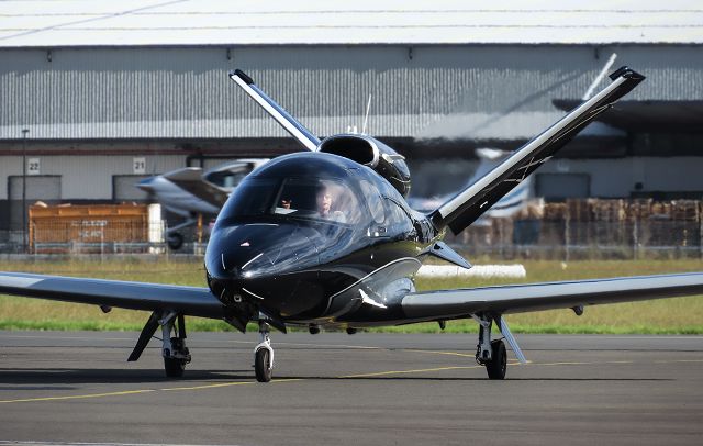 Cirrus Vision SF50 (VH-8L8) - Newly re-registered VH-8L8 on the move at Bankstown after a swift arrival from Canberra. Previously N806PM.