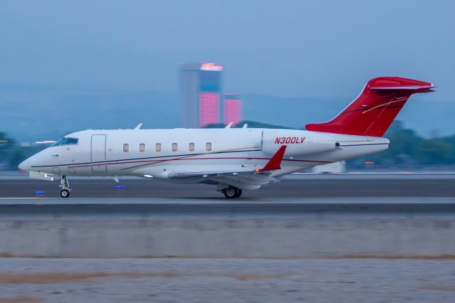 Bombardier Challenger 300 (N300LV) - Taxiing for departure off of 34R to Trenton (10 August, 2021)