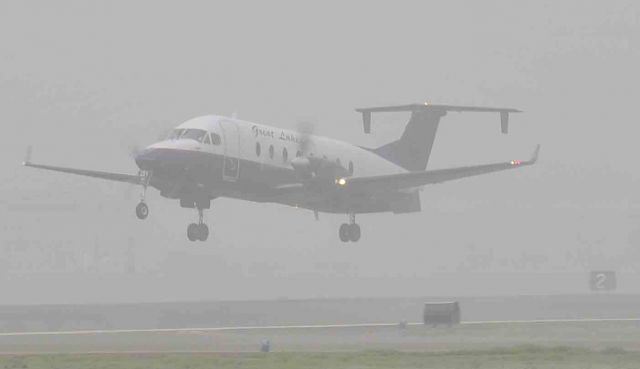 Beechcraft 1900 (N251GL) - 1/4 mile visibility at the Merced Regional Airport