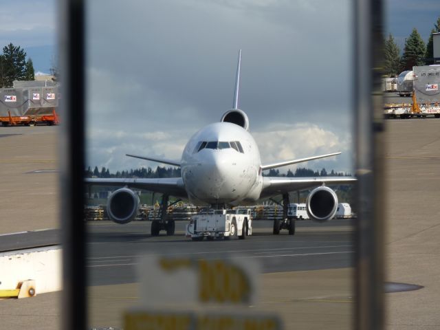 McDonnell Douglas DC-10 (N307FE) - Trying to sneak up on the fueler.