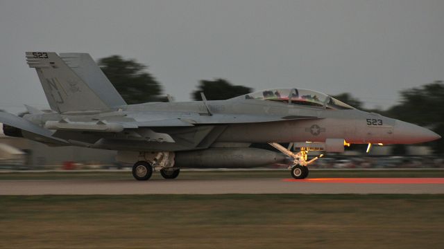 McDonnell Douglas FA-18 Hornet (16-9132) - 523 (169132) of the U.S. Navy E/A-18G Growler Demo Team, VAQ-129, bringing it back in after an amazing performance in the Wednesday evening Air/Firework-Show at EAA AirVenture 2023. br /br /7/26/23