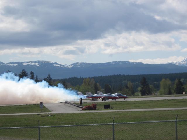 — — - Three CT-114 Tutors  Power up for take-off, CFB Comox Air Base, British Columbia  Canadian Snowbirds Airobatic Team Tail # - 9, 8 and 5