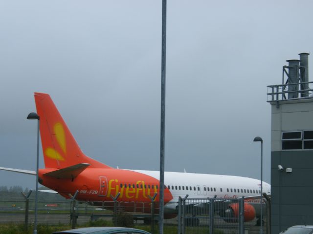 BOEING 737-400 (9M-FZB) - 9M-FZB B737 EX EI-COK AT SHANNON JULY 23 2011 WITH NEW REG APPLIED
