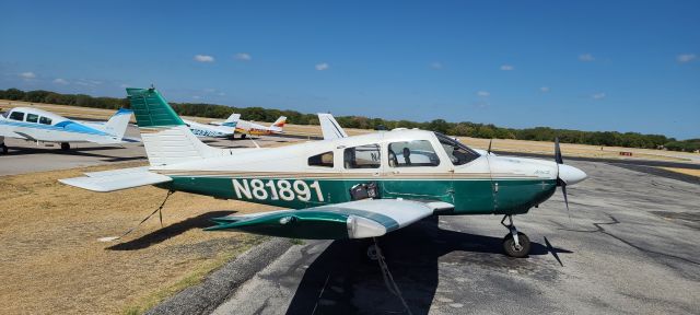 Piper Cherokee (N81891) - KGTU, pre-flighting the aircraft.