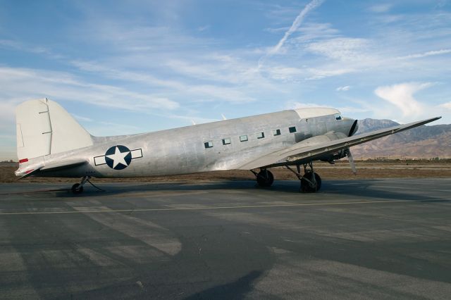Douglas DC-3 (N166LG) - A Douglas DC-3 painted to look like a C-47 military transport @ Rialto airport.