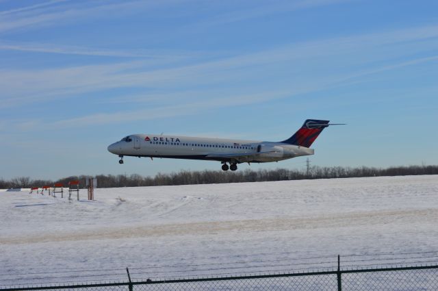 Boeing 717-200 (N959AT) - Flaring on 06L.