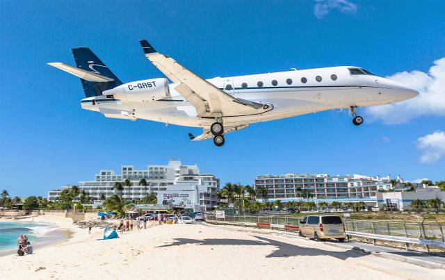 IAI Gulfstream G200 (C-GRST) - A awesome sight to see over the beach at St Maarten.