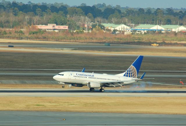 Boeing 737-900 — - Landing on 26L