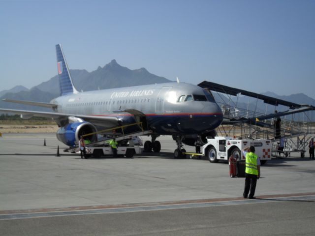 Airbus A319 — - Taken at SJD in October 2010. Somehow I led the passengers the wrong way into the terminal!! OOPS!