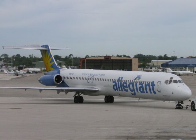 McDonnell Douglas MD-82 (N887GA) - Getting a tow to the gate at Orlando Sanford.