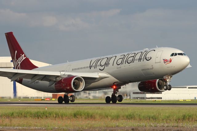 Airbus A330-300 (G-VNYC) - Landing runway 27R at LHR.