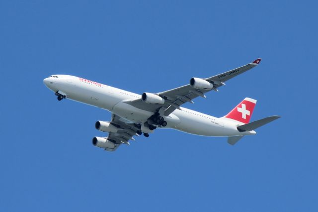 Airbus A340-300 (HB-JMH) - Approximately 10km from KSFO, altitude 2000~2500 feet.br /Releasing landing gears.