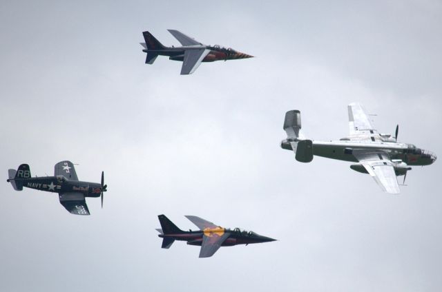 — — - Flying Bulls performing a formation flight for the Airpower 2013