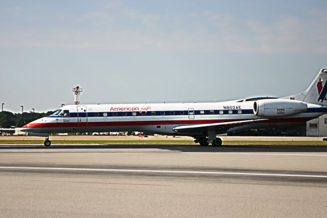 Embraer ERJ-145 (N802AE) - Next to runway 13 at East Texas Regional Airport.