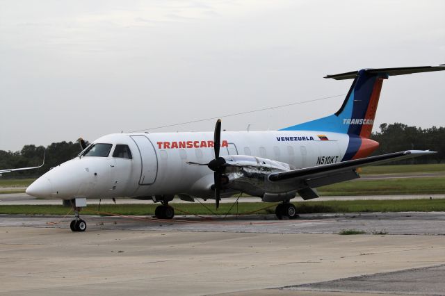 Embraer EMB-120 Brasilia (N510KT) - Orlando Sanford International (SFB). Parked and seemingly withdrawn from use this aircraft was acquired by Transcarga in February 2015 but since March 2017 has been owned by MRO operator Worldwide Aviation.br /Taken from Taken from East 26th Place alongside runway 9Lbr /2017 10 22 a rel=nofollow href=http://alphayankee.smugmug.com/https://alphayankee.smugmug.com//a