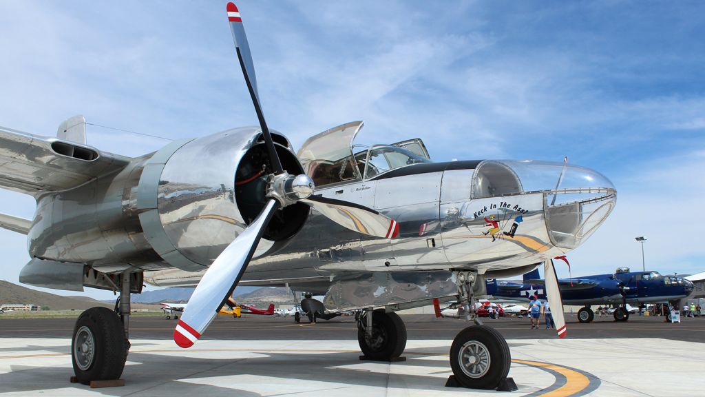 N126HK — - Except for being cropped slightly and then reduced in size in order to upload it into FAs gallery, this picture of a Douglas A-26 Invader on static display at yesterdays Carson City Airport Open House is presented exactly as it came out of the camera.  N126HK, "Keck In The Ass," was one of three "centerpiece" displays along with an OV-10 Bronco and a Cobra helicopter.  "Tootsie," the B-25 in the background of this shot, drew her fair share of admirers, too.