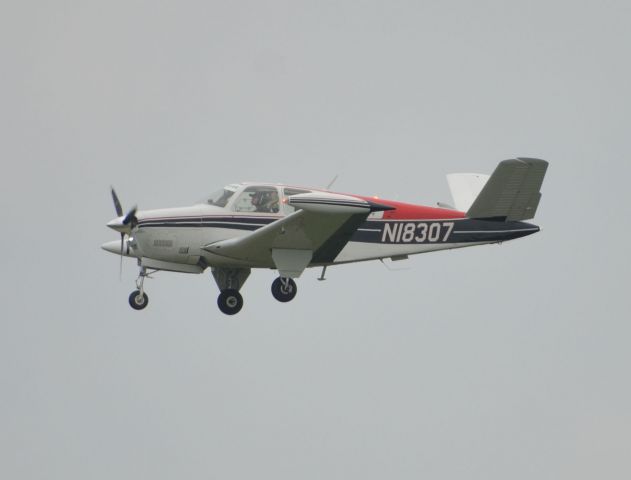 Beechcraft 35 Bonanza (N18307) - Final approach to runway 36 at Airventure 2018 on Sunday.