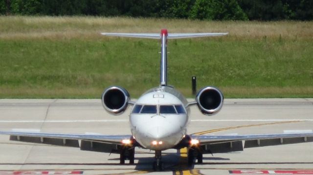 Canadair Regional Jet CRJ-200 (N458AW) - U.S. Airways (Air Wisconsin) 4237 arriving from Washington Reagan National 12:48 P.M..   Taken June 7, 2015.  