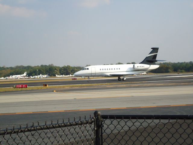 Dassault Falcon 2000 (M-ROWL) - just landed R20L 10/18/10