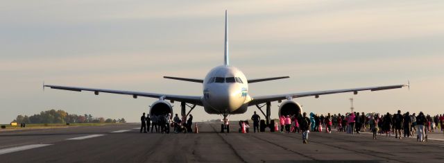 Airbus A319 (N717UW) - Taken Oct. 31, 2015 KCLTs 5K Runway Run/Walk on runway 5/23