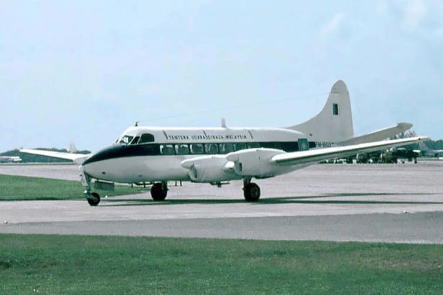 Hawker Siddeley Heron — - De Havilland DH-114 Heron of the Royal Malaysian Air Force Butterworth WMKB mid 1970s.