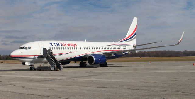 Boeing 737-800 (N917XA) - A Boeing 737-800 on the ramp at NW Alabama Regional Airport in Muscle Shoals, AL - December 14, 2016. This aircraft transported the University of North Alabama Lion football team to the NCAA Division II Semi-Finals and National Championship game. 