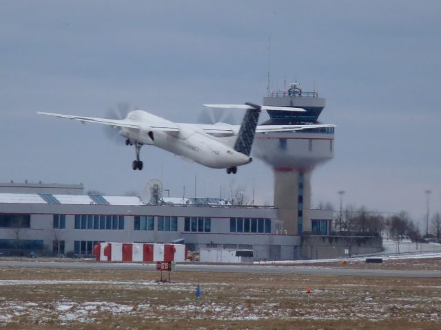 C-GLQL — - taking off of #25 in front of control tower