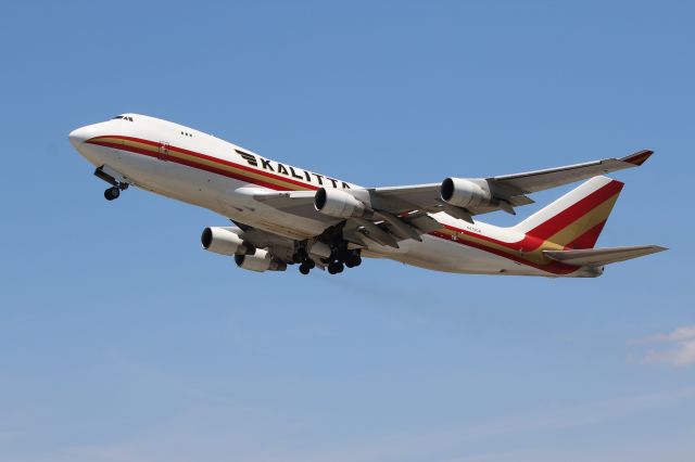 Boeing 747-400 (N710CK) - Miami (MIA). Kalitta Air flight K4539 climbs away from runway 27 departing for Santiago Arturo Merino Benítez (SCL). br /Taken from El Dorado Furniture Store, NW 72nd Avenue adjacent to runway 27/09 south of the airfieldbr /br /https://alphayankee.smugmug.com/Airlines-and-Airliners-Portfolio/Airlines/AmericasAirlines/Kalitta-Air-K4/br /br /2021 05 01