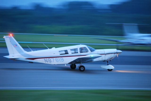 Piper Saratoga/Lance (N87619) - BELLEFONTE INC Ram Air Freight taxiing in from runway 02 at KJQF - 6/15/09