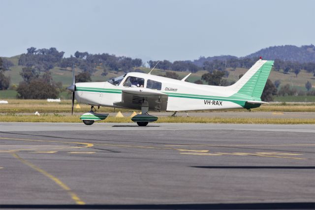Piper Cherokee (VH-RAX) - Australian Indigenous Business Services (VH-RAX) Piper PA-28-140 Cherokee Cruiser taxiing at Wagga Wagga Airport.