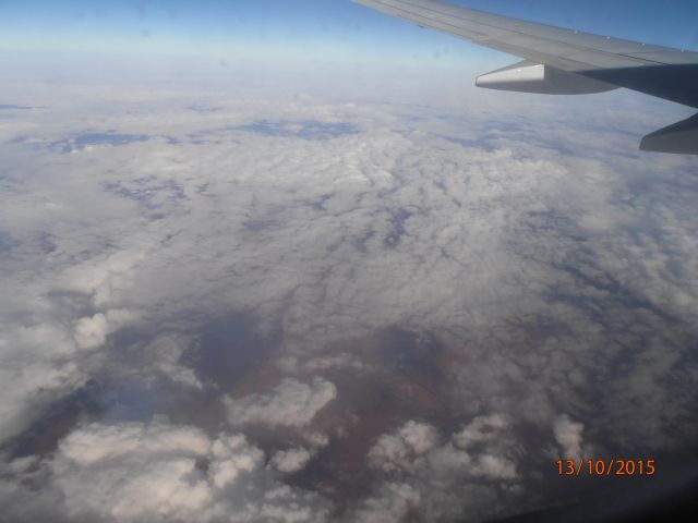 Boeing 737-800 (VH-YIB) - Virgin Australia Boeing 737-800 from Denpasar to Perth Airport. Flying over the clouds. 