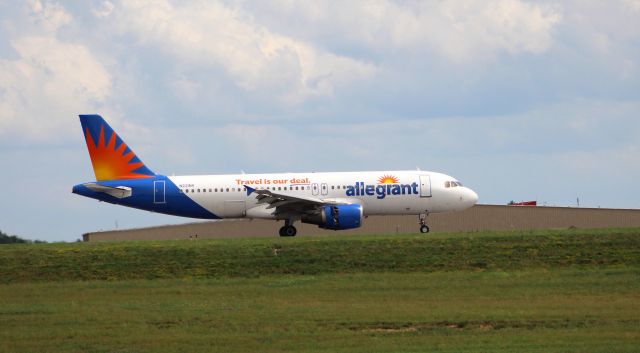 N221NV — - This Allegiant Airbus A-320 just arrived from Ft. Lauderdale, FL., KFLL and with engine reversers deployed is slowing down on runway 22 at Lexingtons Bluegrass Airport, KLEX.