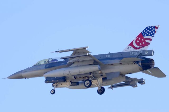 Lockheed F-16 Fighting Falcon (93-5035) - Republic of Singapore Air Force Lockheed-Martin F-16DJ Block 52 Fighting Falcon 93-5035 of the 425th Fighter Squadron Black Widows participating in Forging Sabre Exercise.  Its special tail markings commemorate the 25th anniversary of the Singapore detachment at Luke Air Force Base.