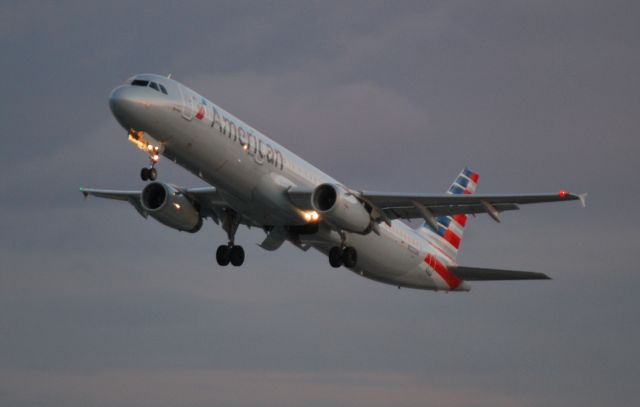 Airbus A321 (N521UW) - Departing runway 36C at dusk - 11/1/14