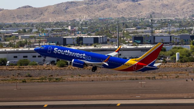 Boeing 737 MAX 8 (N8705Q) - Southwest Airlines 737 MAX 8 taking off from PHX on 7/6/22. Taken with a Canon 850D and Rokinon 135mm f/2 lens.