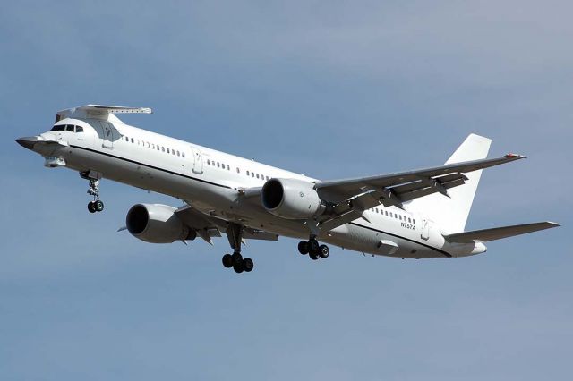 Boeing 757-200 (N757A) - The first Boeing 757-200 N757A, which now serves as the F-22 Avionics testbed, at Air Force Plant 42 at Palmdale on February 13, 2006. The F-22 Avionics testbed has the nose of an F-22 mounted on its forward fuselage. A sensor wing is mounted above the cockpit. F-22 electronic warfare (EW) and communication, navigation and identification (CNI) sensors are mounted on the sensor wing. A simulated F-22 cockpit is installed in the cabin. 