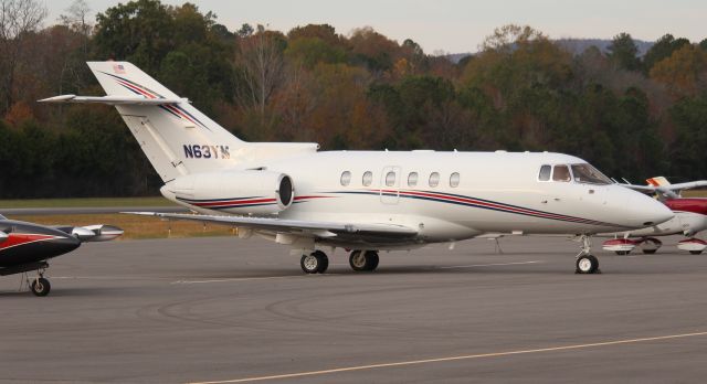 Hawker 800 (N63YM) - A hawker 800XP on the ramp at Word Field, Scottsboro Municipal Airport, AL - late afternoon, November 1, 2022.