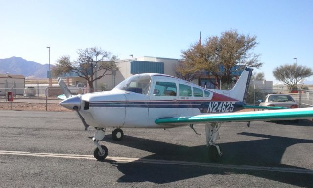 Beechcraft Sierra (N24625) - airplane being ready for flight outside hanger