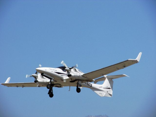 Diamond Twin Star (N243TS) - Taking off from RWY 26L