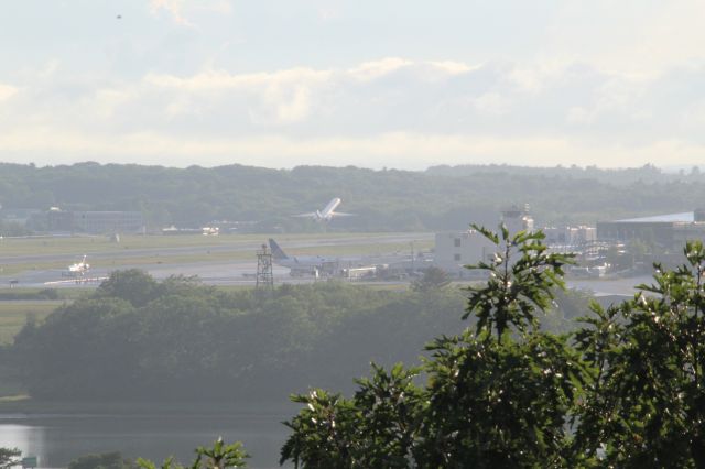 McDonnell Douglas MD-90 — - Thought this shot was pretty cool, don't know about you guys. KPWM from a far with an MD-90 just lifting off ft. a nice tree