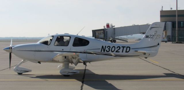 Cirrus SR-22 (N302TD) - Rickie Traeger took this photo while planespotting at the Rockford Airport (KRFD)  on December 6th 2015. 