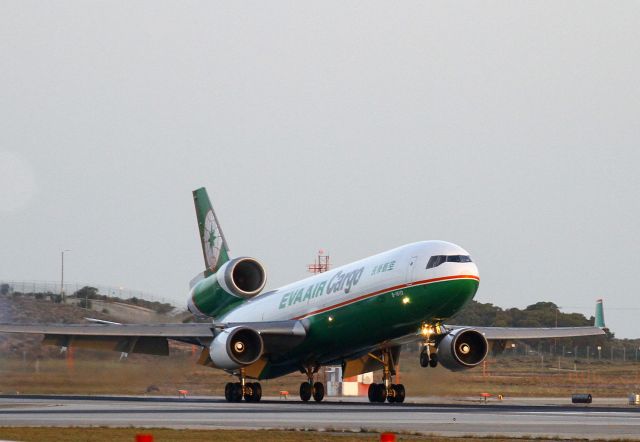 Boeing MD-11 (B-16113) - Early morning arrival on runway 6R LAX