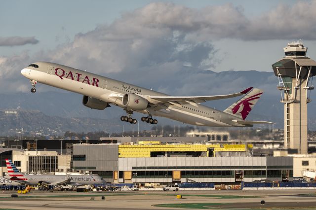 A7-ANF — - 25th January, 2024: East Imperial Ave view of Qatar Airways Airbus A350-1000 operating as flight QR740 bound for Doha's Hamad International takes off from rwy 25R at LAX with its iconic control tower and the famous 'Hollywood' sign in the background. 