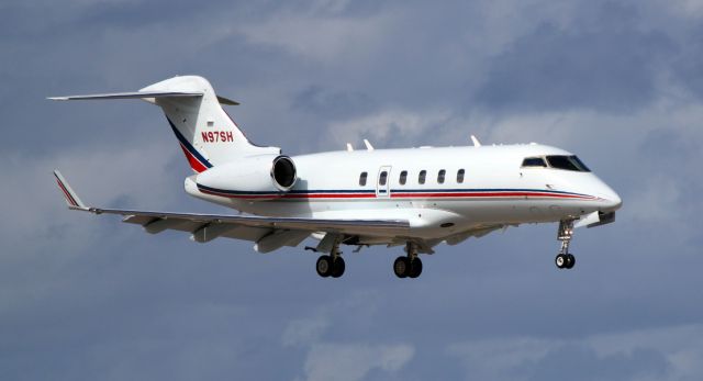 Bombardier Challenger 300 (N97SH) - Challenger 300 arriving at BQN. Nice looking jet.